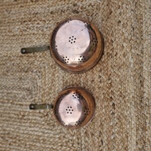A pair of Antique Vintage French Copper & Brass Graduated Colanders