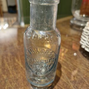 Sharps Furniture cream  Glass bottle.
