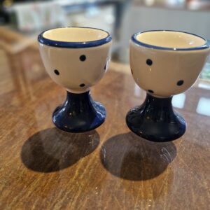 A pair of Cute Farmhouse polka dot egg cups , cream and navy.